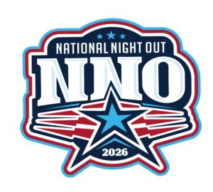 Logo for National Night Out 2026 featuring large white “NNO” letters on a dark blue shield-shaped background. Red, white, and blue stars and stripes surround the text, with a large blue star at the center and “National Night Out” above. The year “2026” appears below the star. The design uses patriotic red, white, and blue colors.